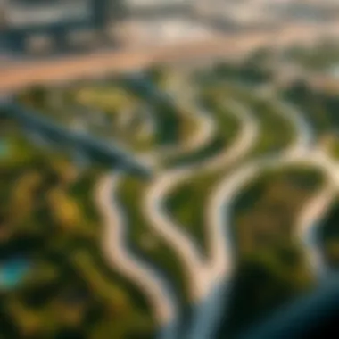 Aerial view of Dubai Hill Park showcasing its lush green spaces and pathways