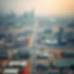Aerial view of Ajman with Dubai skyline in the background